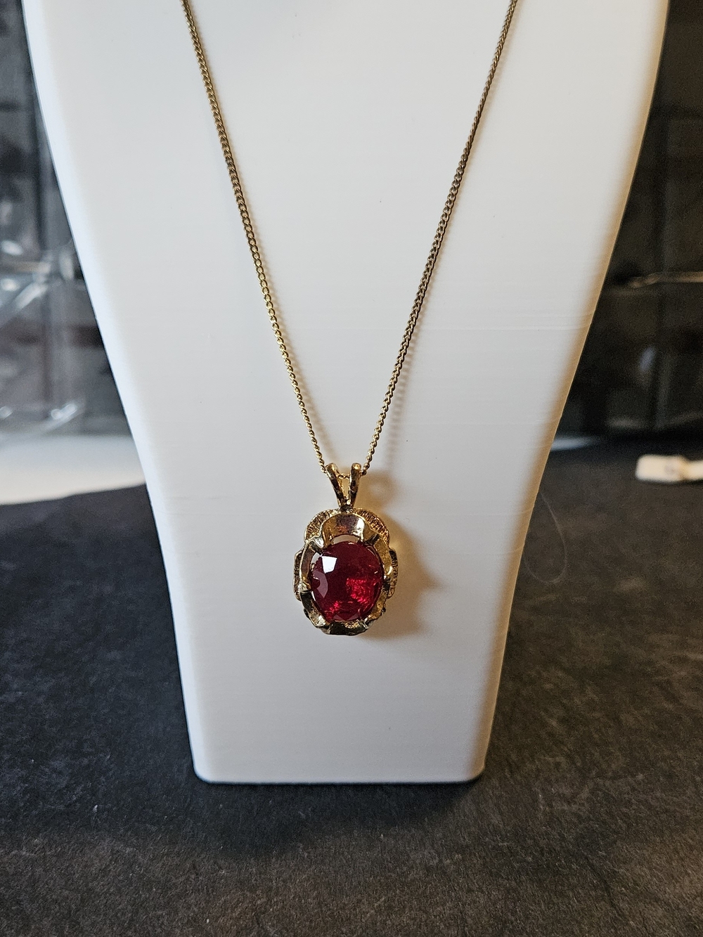 Costume Gold Pendant Necklace with Deep Red Oval Gemstone. 24" Chain